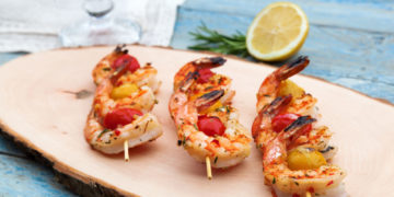 Sekretne życie owoców morza – Pieczony łosoś norweski w zielonym sosie